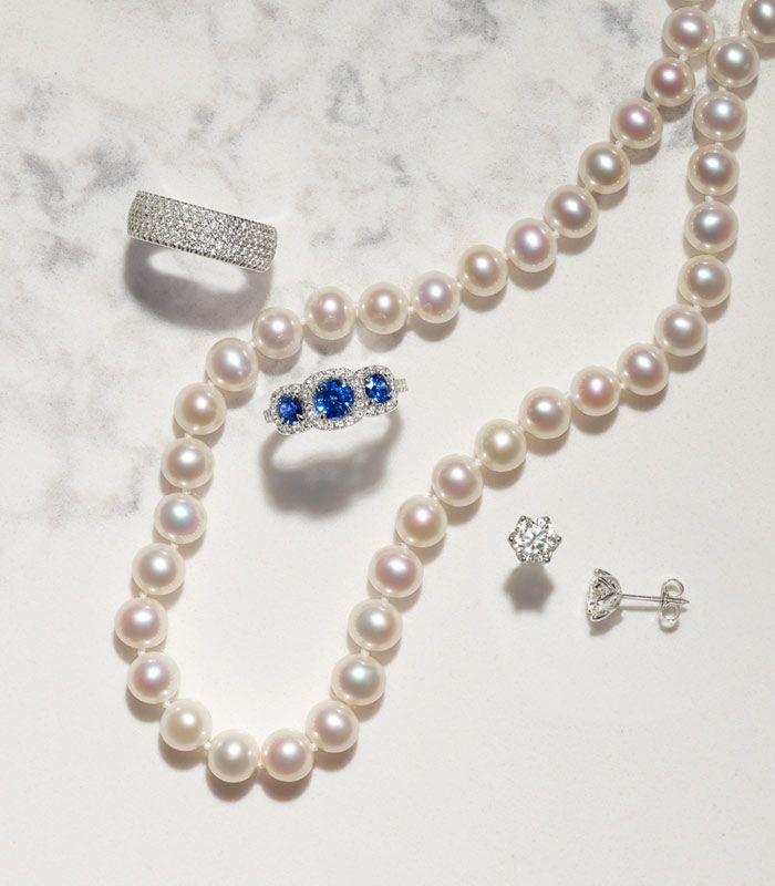 Diamond Ring, Pearl Necklace, Sapphire Ring, and Diamond Earrings